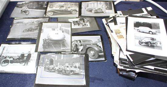 A group of vintage early motoring photos and negatives including John Cobbs 1947 landspeed record car and an enlarger